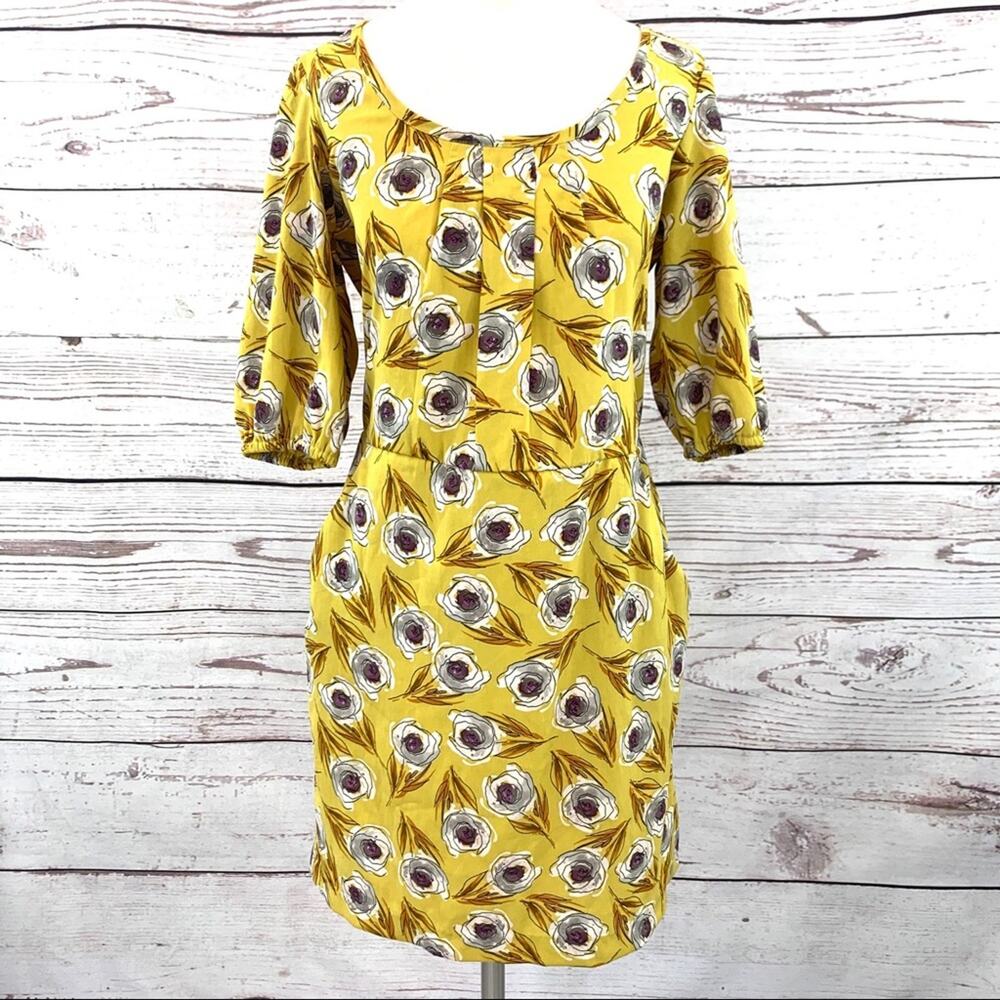 B. Smart mustard yellow pleated pockets